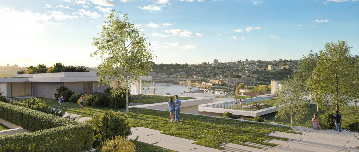Landscaped gardens and paths at O'RIZON LIVING, with the Douro river and Porto beyond
