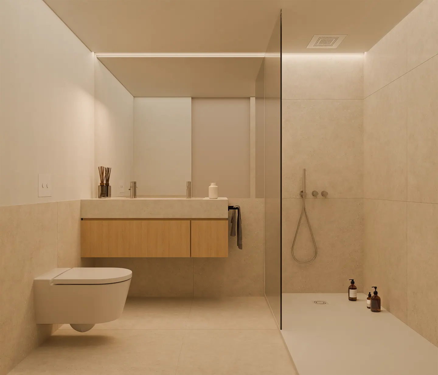 Bathroom in natural stone tones with a walk-in shower