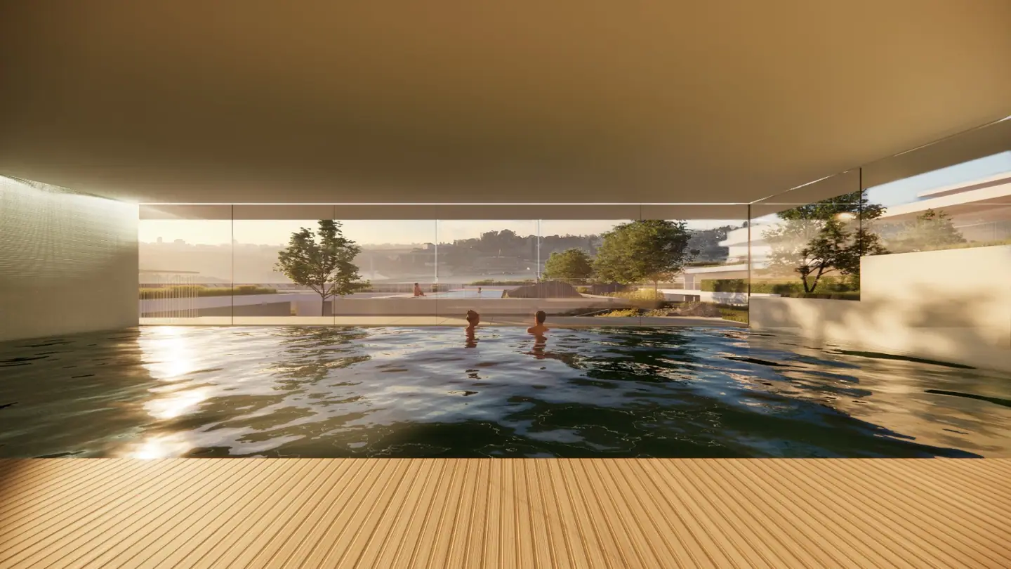 Covered pool with a wooden deck, open to the view
