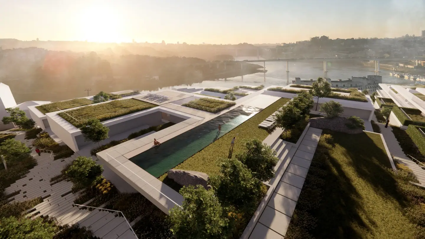 Green roofs and a rooftop pool at sunset, with the river behind